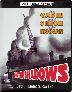 Cover of the film 'Port of Shadows' featuring a silhouette of a harbor crane, with the title prominently displayed in red. The names of the lead actors, Jean Gabin, Michel Simon, and Michèle Morgan, are featured above the title, along with the text 'a film by Marcel Carné' at the bottom.