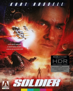 Movie poster for 'Soldier' featuring Kurt Russell's face in the foreground with a space background and spaceships.
