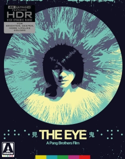 A stylized movie poster for 'The Eye,' featuring a central image of a person with a short haircut surrounded by colorful, swirling patterns, indicative of a horror film theme.